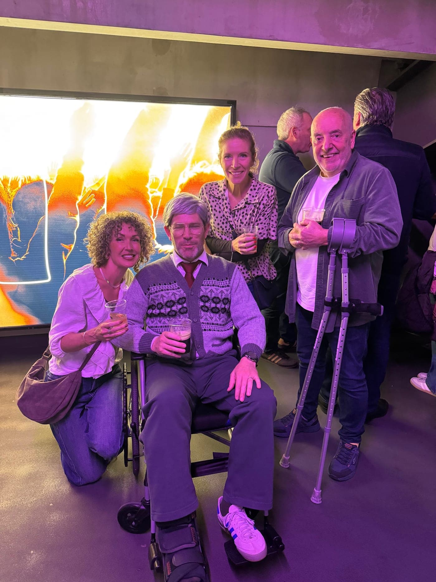 Customer in fancy dress at a Peter Kay show in Dublin with a rented wheelchair after breaking a leg